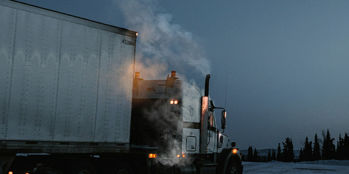 Semi Truck in Winter - Side view - steam/smoke